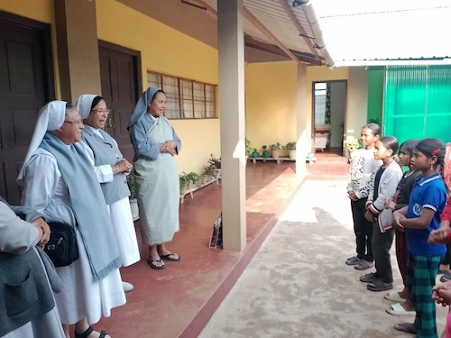 Sisters and children at Auxilium Mawpat